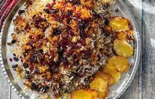 طرز تهیه گردو پلو با مرغ؛ پلو مخلوط خوشمزه و مقوی