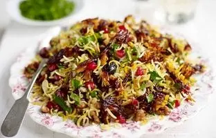 آشنایی با روش تهیه انار پلو با پرک بادام+ فوت و فن
